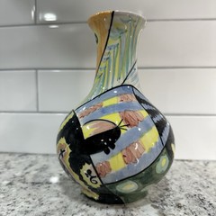 Clay Motif Handpainted 8″ T flower vase abstract yellow flowers black red green