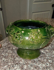 Vintage Green Redware Pottery piece from Oaxaca, Mexico, featuring an applied fl