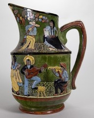 A Major C.1930 Tlaquepaque Mexican Green Pottery Pitcher – Dance/Music Motif