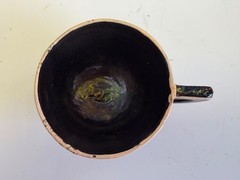 Vintage Mexican Tlaquepaque black cup w/white donkey 3 1/2″ diam.