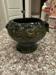 Vintage Green Redware Pottery piece from Oaxaca, Mexico, featuring an applied fl