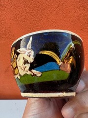 Vintage Mexican Tlaquepaque black cup w/white donkey 3 1/2″ diam.